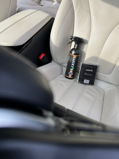 Leather cleaner - 500ml-Leather cleaner-Lucky’s car care Lucky’s Leather Cleaner and Scrub Pad placed on a white leather seat – the perfect duo for deep cleaning and restoring leather surfaces. The powerful yet gentle leather cleaner removes dirt and stains, while the soft scrub pad lifts grime without damaging the material. Ideal for maintaining bright, fresh, and well-protected leather seats.