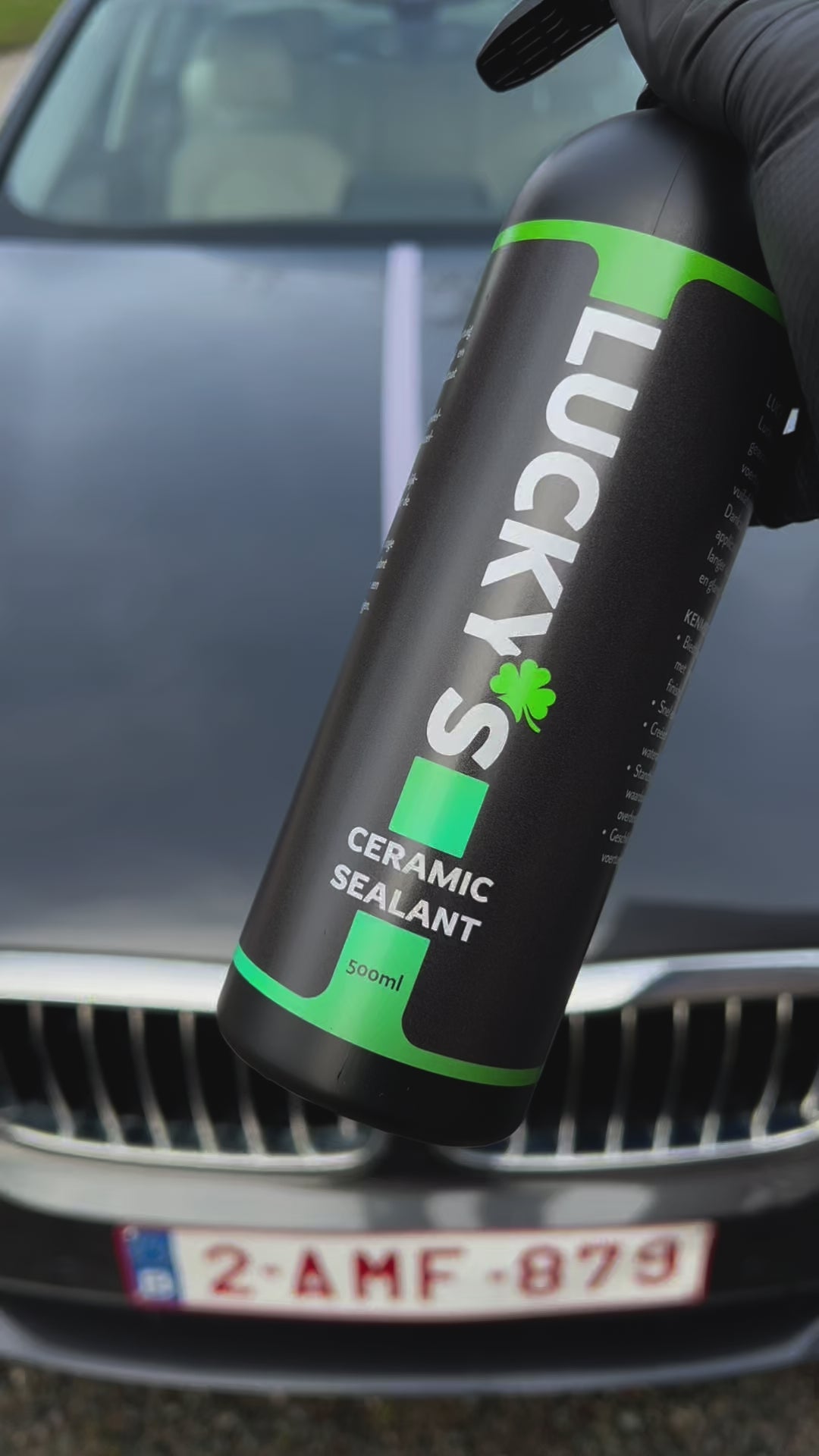 Demonstration of Lucky’s Ceramic Sealant – long-lasting paint protection with over 3 months of durability. One side of the car hood is treated with the ceramic sealant using an applicator glove, while the other side remains untreated. When water is poured over the surface, the treated side clearly repels water and provides protection, whereas the untreated side retains water. Perfect for long-term hydrophobic protection of car paint.